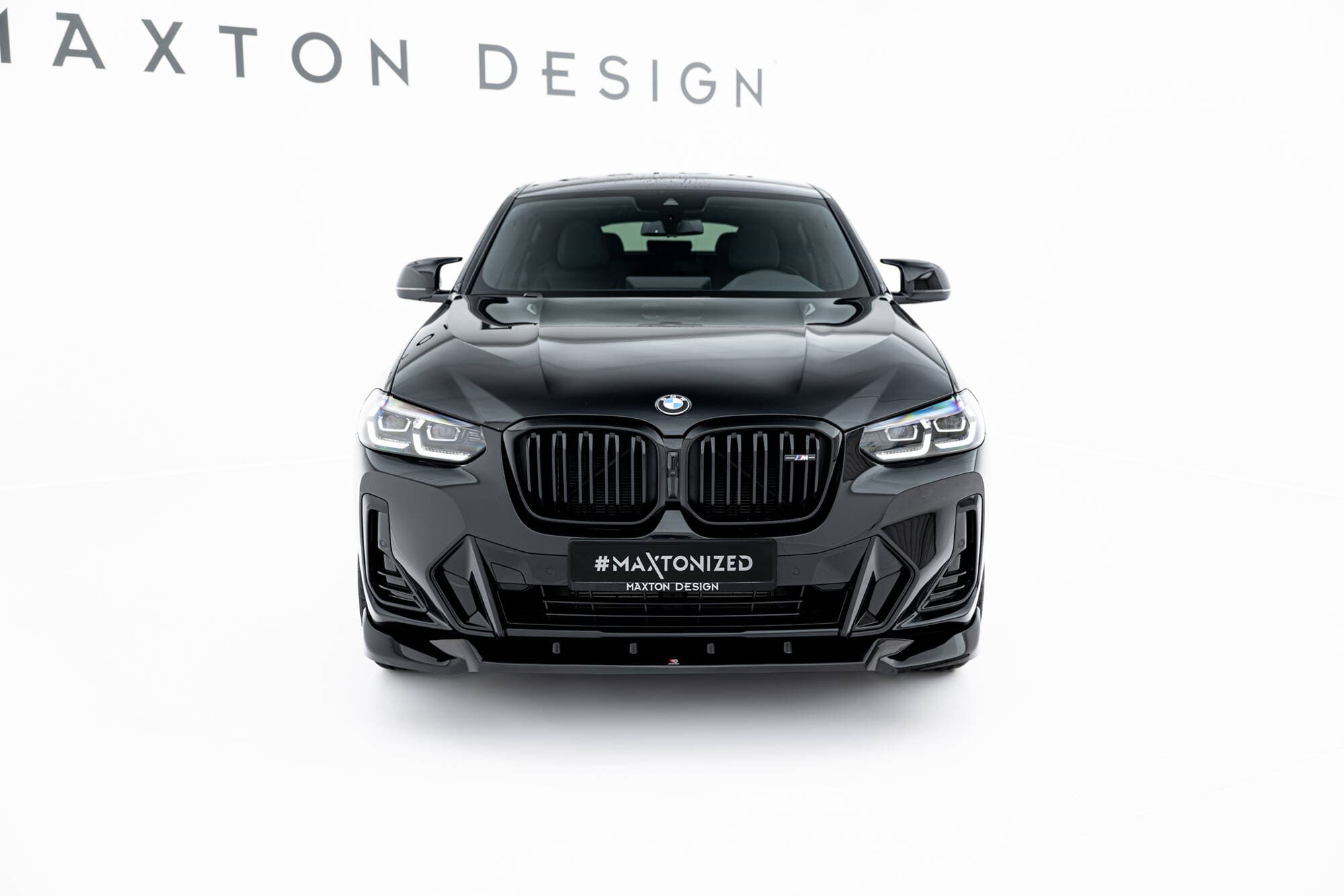 Set splitters op BMW X4 M-Pakket G02 Facelift, bodykit gemonteerd door Wrapmaster DH Den Haag